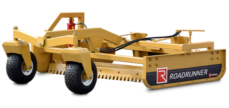 BBDE0FA7-0EBC-4731-B52A-B65C50132067 yellow skid steer grader on display with white background